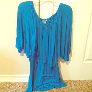 ** Sold*lor is amazing - very flowy off the should