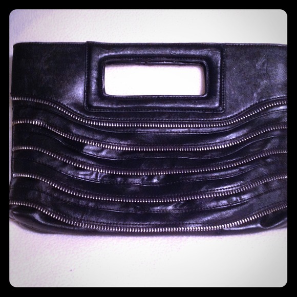 Reduced and on hold Black Zipper clutch