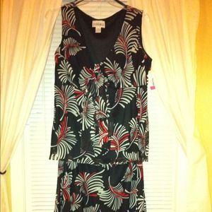 Matching sleeveless blouse and skirt