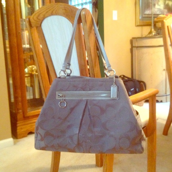 Large signature gabby weekender tote.