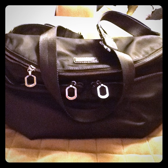 Aigenisi Collection Handbag