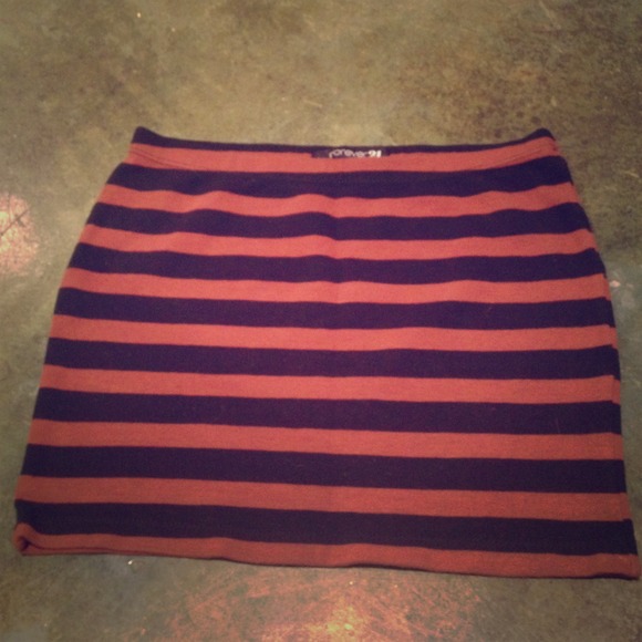 Tan and black mini skirt