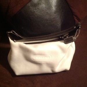 Reduced 💵 Coach small white and brown purse.