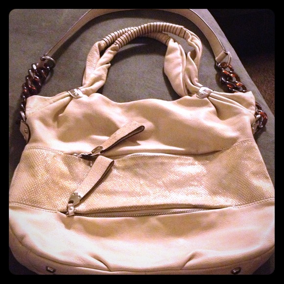 B Makowsky purse with cheetah print inside