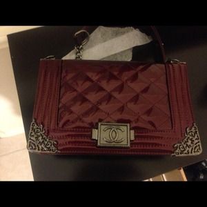 burgundy lacquered handbag