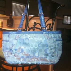 *Reserved - 2 Authentic Coach. Gently used