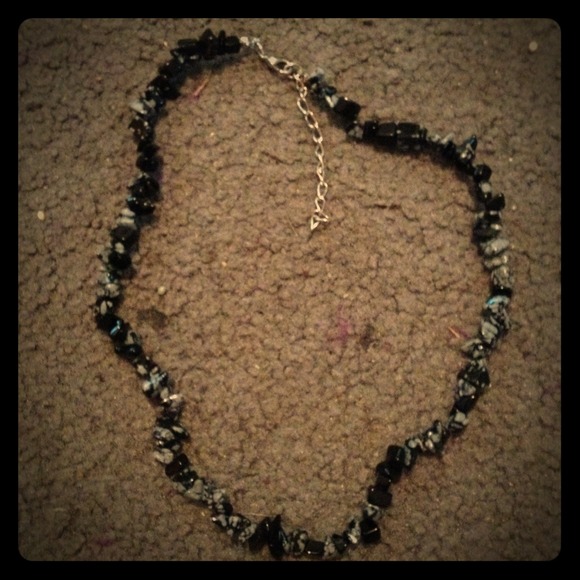 Gray and black, good condition, adjustable clasp