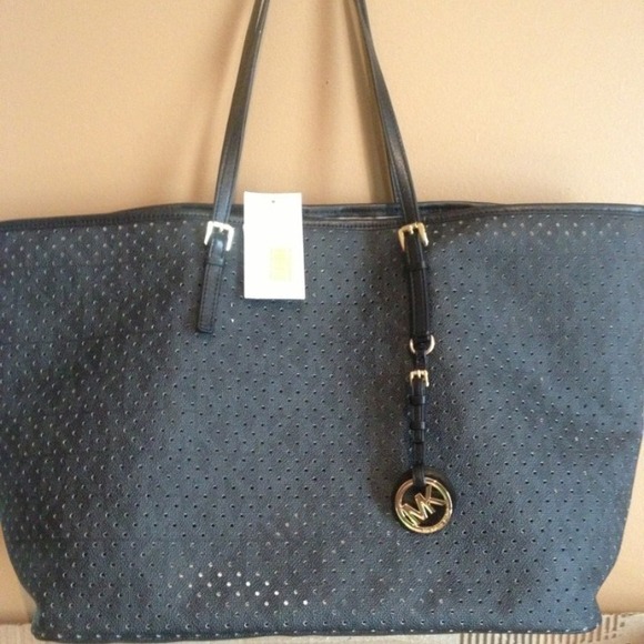 Brand new Michael kors hand bag w / tags