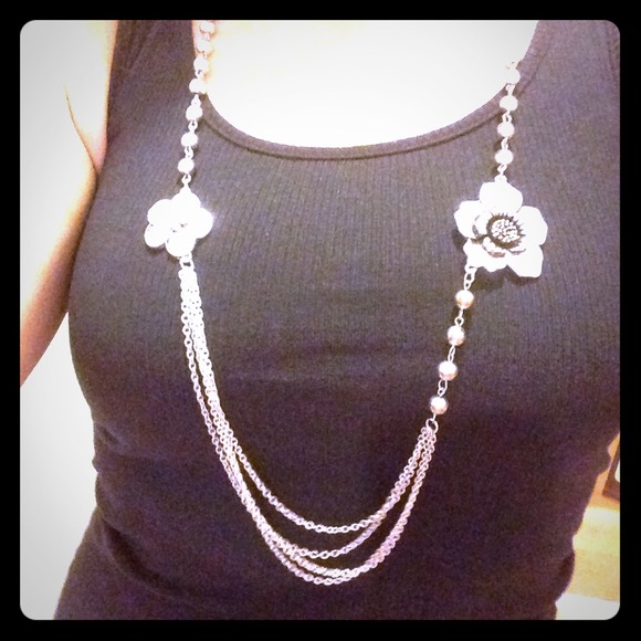 Long, silver flower necklace