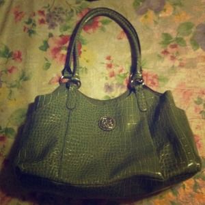 Green faux snakeskin handbag