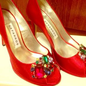 CAPARROS Red Satin peep toe pumps
