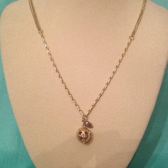 Long gold-tone necklace great for layering!