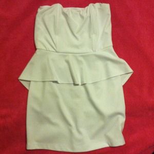 White peplum dress worn once and it's dry cleaned.
