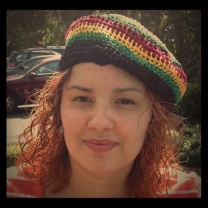 Hand made Crochet hat red,gold, green and black.
