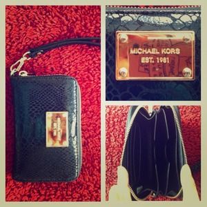 MK jet set continental wallet