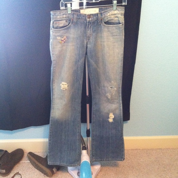 flare jeans with cute flower emblems !