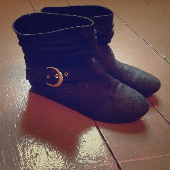 Simple black booties with silver buckle