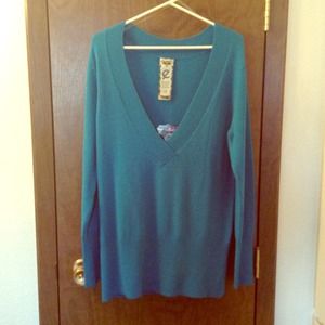 Brand new low v-neck sweater.