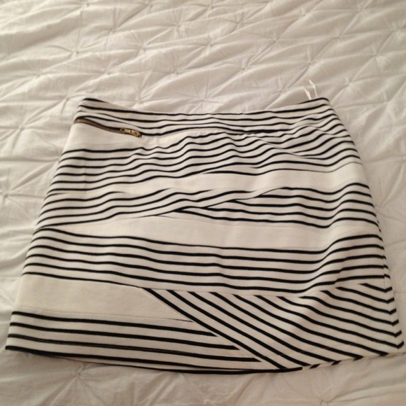 MM Couture  Dresses & Skirts - Super cute black striped mini skirt
