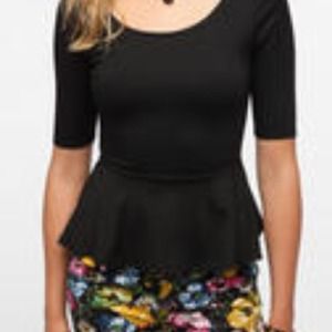Black pins and needles peplum top