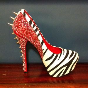 Zebra sky high heels with red jeweled/spiked heel