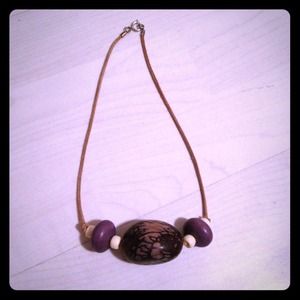 Wooden beaded necklace on leather chain