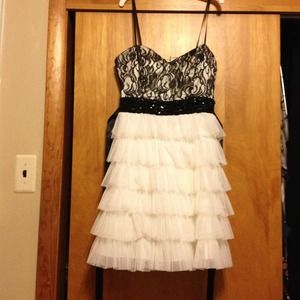 Frilly, flirty, young party dress. Only worn once!