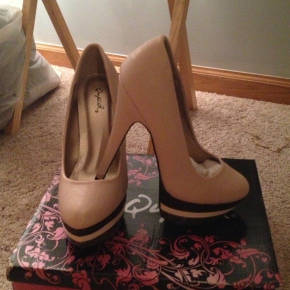 Nude 3.5 in. platform pumps