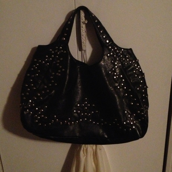 Black studded vegan bag.      REDUCED💙💜❤