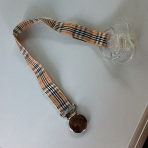 Burberry inspired pacifier clip. Never used!