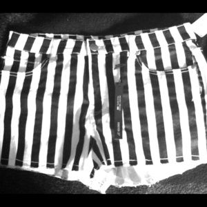 High wasted black and white striped shorts.