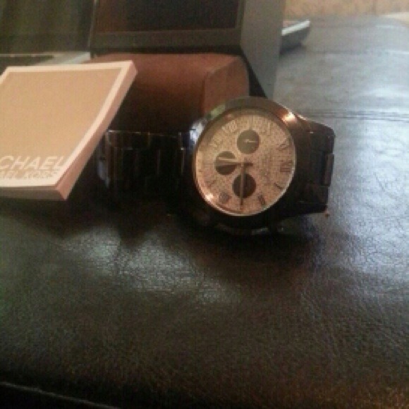 Michael Kors Black Watch with Rhinestone face.