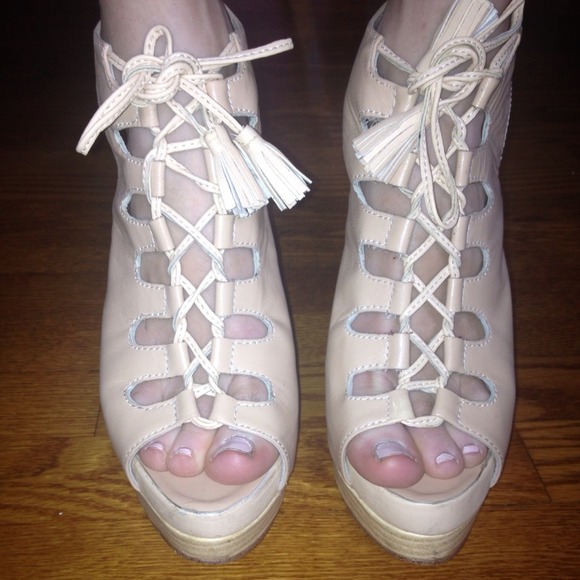 Louboutins Beige heels. They are not authentic.