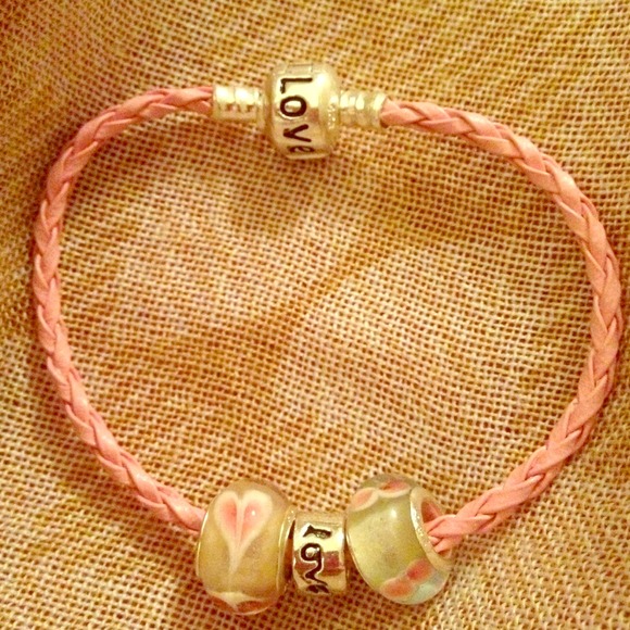Beautiful corded bracelet with beads and charm