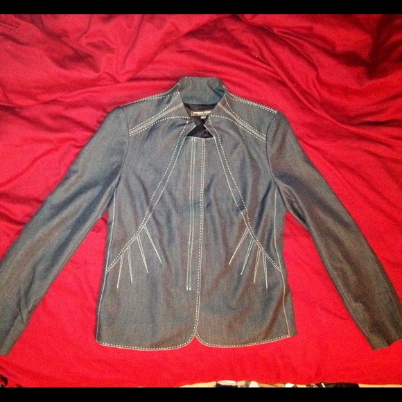 Stylish dark lightweight jean jacket.