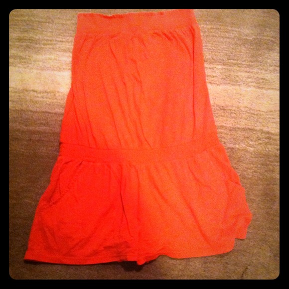 Coral colored strapless romper !