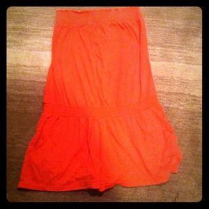Coral colored strapless romper !