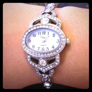 Silver watch and earrings bundle