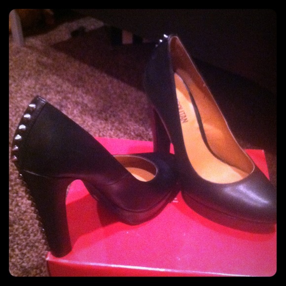 Spiked black leather heels