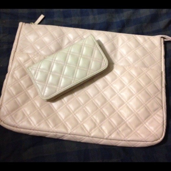 Pink quilted laptop case and wallet.