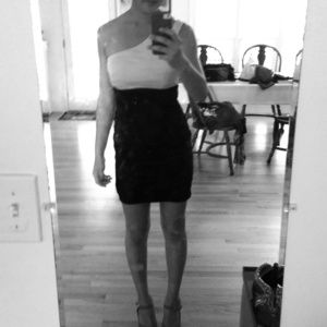 White and black double strapped one shoulder dress