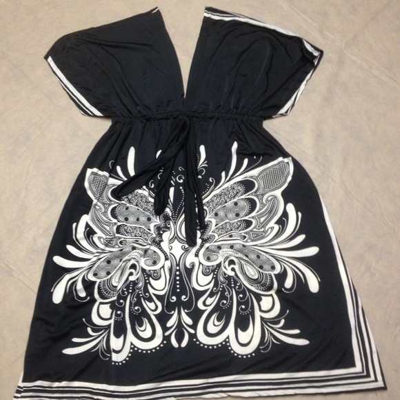Black and off white peasant style silly dress.