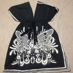 Black and off white peasant style silly dress.