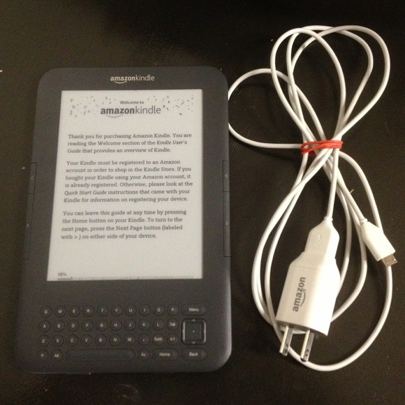 A black kindle with charger.