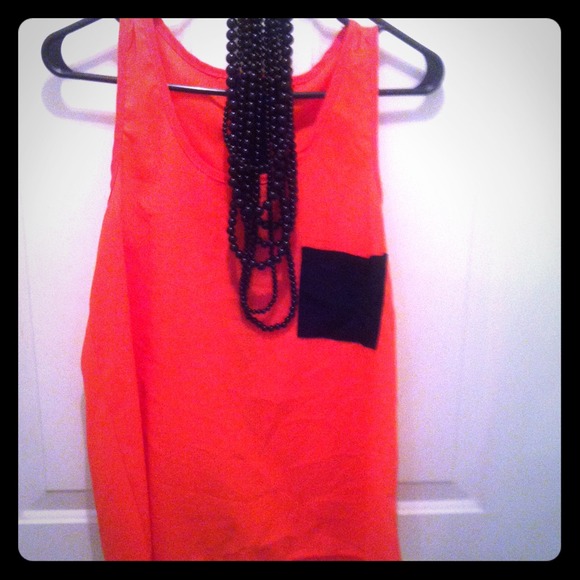 Coral black top with darling back button detail