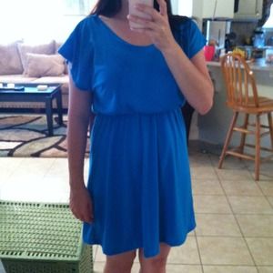 Blue dress. Tie back detail.