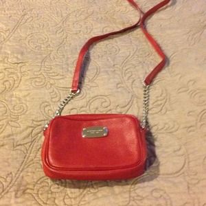 Red Michael Kors crossbody bag