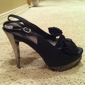 Silver and black heels