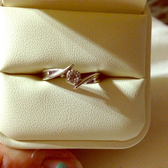 14kt white gold diamond ring.