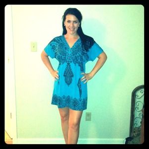 Turquoise dress with black print